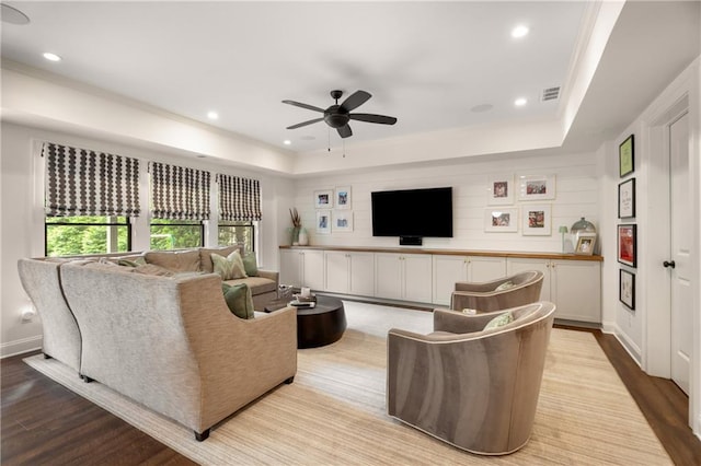 4823 Layfield Dr, Dunwoody, GA 30338 - living room featuring a raised ceiling, ceiling fan, wood finished floors, recessed lighting, and baseboards