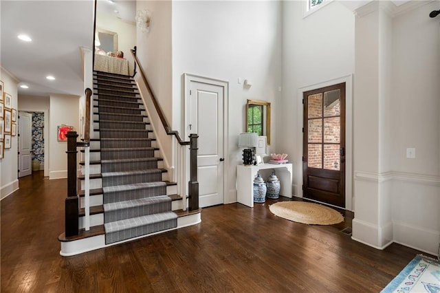4823 Layfield Dr, Dunwoody, GA 30338 - foyer featuring wood finished floors, stairs, baseboards, recessed lighting, and a towering ceiling