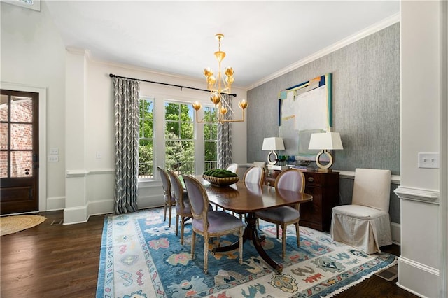 4823 Layfield Dr, Dunwoody, GA 30338 - dining space with a chandelier, wood finished floors, crown molding, and baseboards