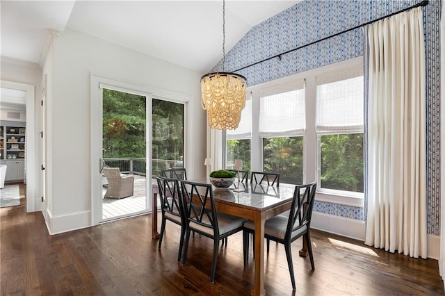 4823 Layfield Dr, Dunwoody, GA 30338 - dining room featuring lofted ceiling, a chandelier, healthy amount of natural light, dark wood-style flooring, and baseboards
