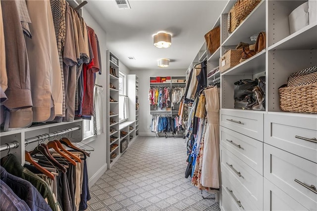 4823 Layfield Dr, Dunwoody, GA 30338 - walk in closet with light colored carpet