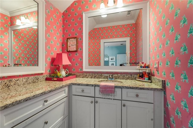 4823 Layfield Dr, Dunwoody, GA 30338 - bathroom with wallpapered walls, vanity, and crown molding