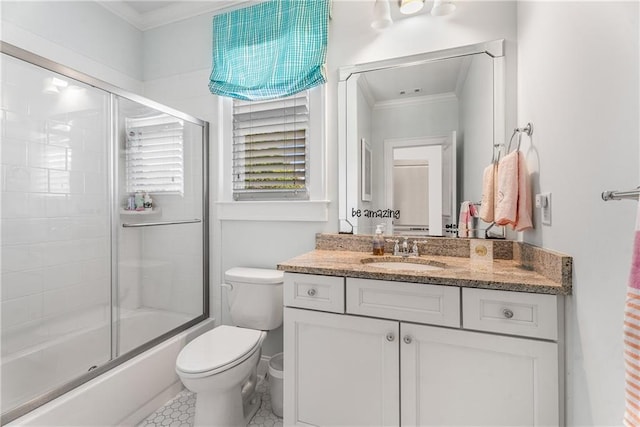 4823 Layfield Dr, Dunwoody, GA 30338 - full bathroom featuring toilet, vanity, crown molding, and shower / bath combination with glass door