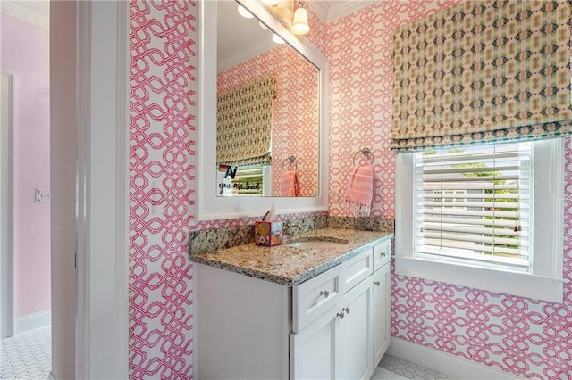 4823 Layfield Dr, Dunwoody, GA 30338 - bathroom featuring wallpapered walls, crown molding, and vanity