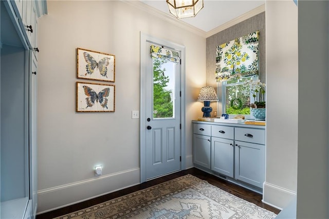 4823 Layfield Dr, Dunwoody, GA 30338 - doorway featuring crown molding, dark wood-style flooring, and baseboards
