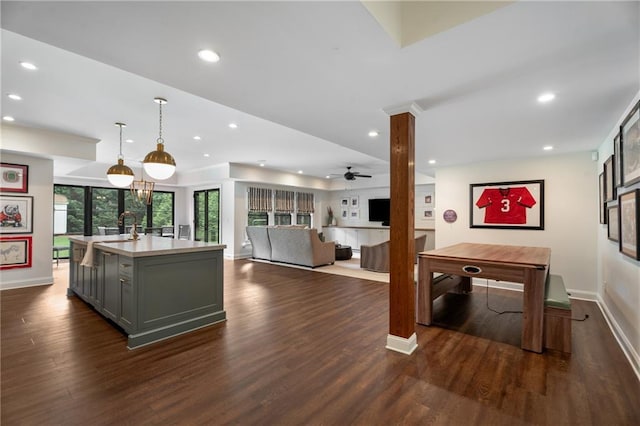 4823 Layfield Dr, Dunwoody, GA 30338 - kitchen with gray cabinetry, baseboards, dark wood-type flooring, recessed lighting, and ceiling fan