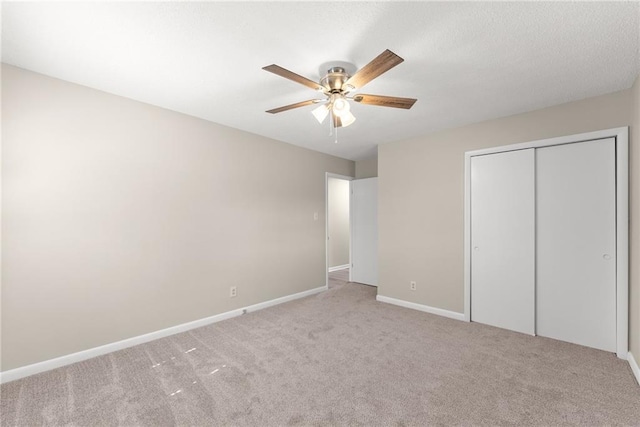 1292 Fernside Dr, Toccoa, GA 30577 - unfurnished bedroom featuring carpet floors, baseboards, a closet, and a ceiling fan