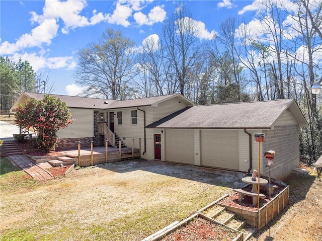 1292 Fernside Dr, Toccoa, GA 30577 - back of property featuring a garage, roof with shingles, and dirt driveway