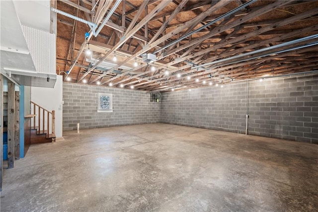 1292 Fernside Dr, Toccoa, GA 30577 - below grade area featuring stairs and concrete block wall
