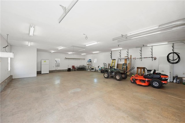 1292 Fernside Dr, Toccoa, GA 30577 - garage featuring freestanding refrigerator