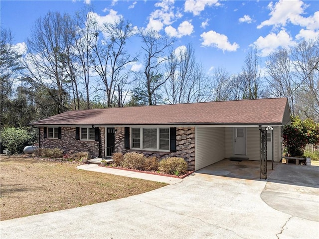 1292 Fernside Dr, Toccoa, GA 30577 - ranch-style house with concrete driveway, a carport, and brick siding