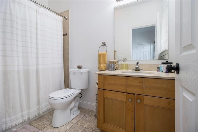 bathroom with tile patterned flooring, a shower with curtain, toilet, and vanity