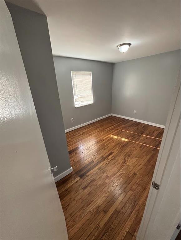 561 Formwalt St SW Unit 8, Atlanta, GA 30312 - spare room featuring dark hardwood / wood-style floors