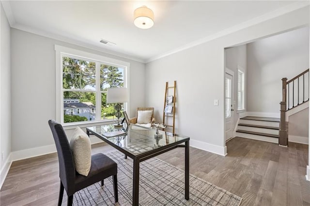 office area featuring ornamental molding and hardwood / wood-style floors