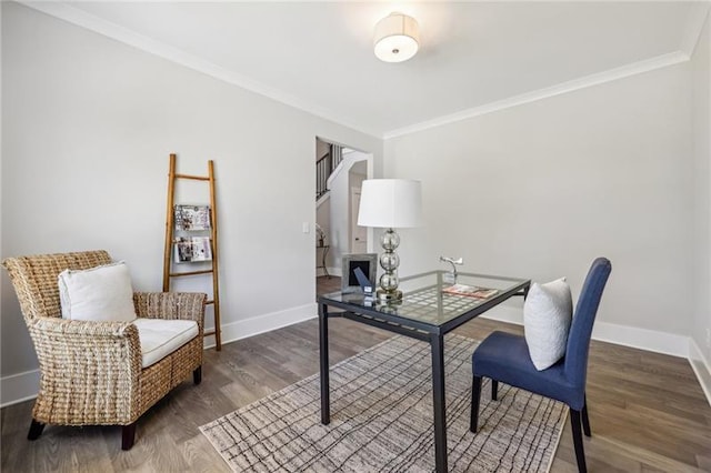 office space with ornamental molding and dark wood-type flooring