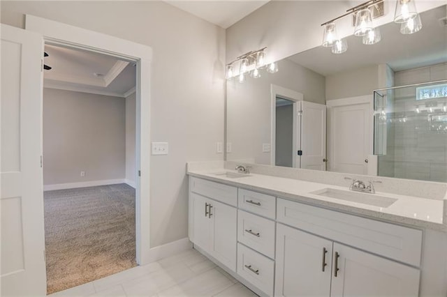 bathroom with tile patterned flooring, vanity, and a shower with shower door