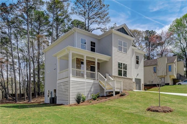 view of front of house with covered porch, a front yard, and central air condition unit