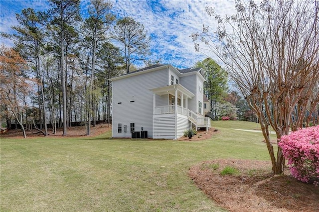 back of house featuring a yard