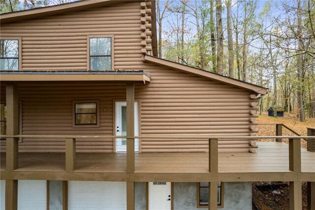 view of property exterior featuring a garage