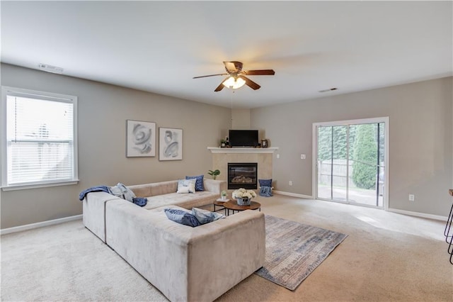 4092 Duran Ln, Auburn, GA 30011 - carpeted living room featuring a ceiling fan and a tile fireplace