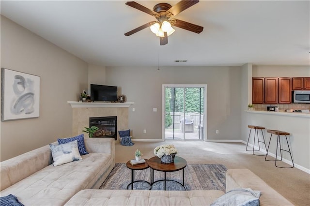 4092 Duran Ln, Auburn, GA 30011 - living room featuring light carpet, a premium fireplace, and ceiling fan