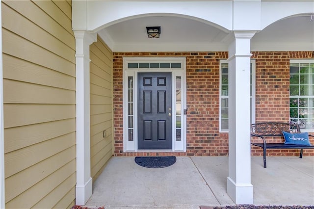 4092 Duran Ln, Auburn, GA 30011 - property entrance with a porch and brick siding