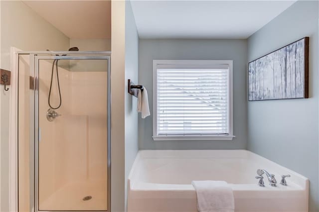 4092 Duran Ln, Auburn, GA 30011 - bathroom with a stall shower and a bath