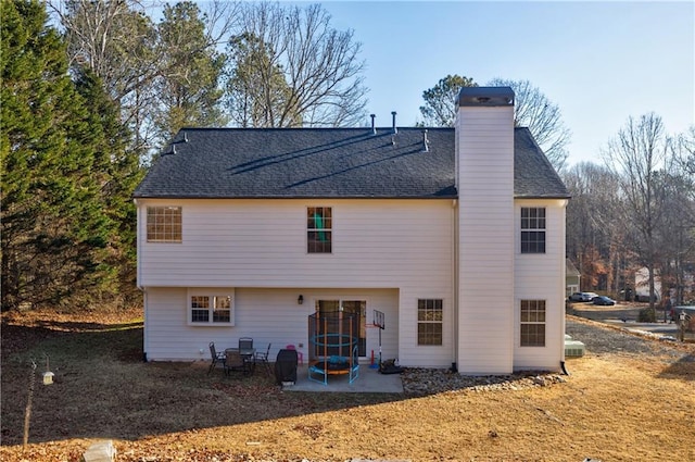 back of property featuring a patio