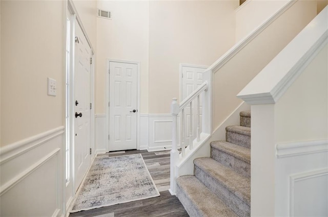 entryway featuring dark wood-type flooring