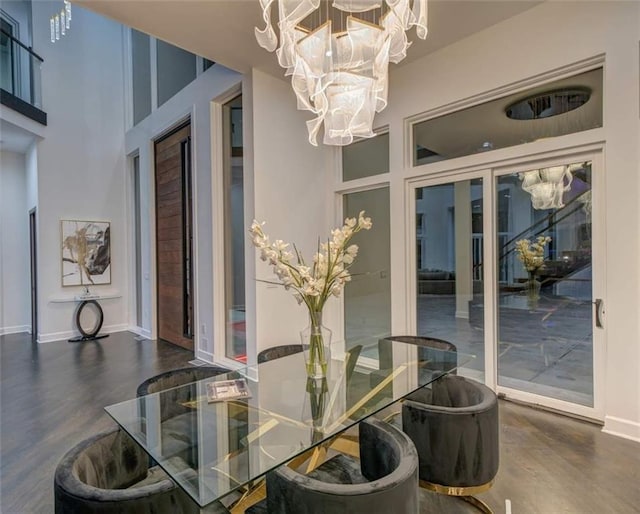 dining space with an inviting chandelier