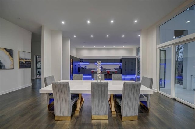 dining area featuring dark hardwood / wood-style floors