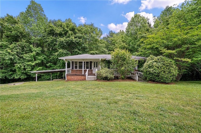 exterior space featuring a porch and a front lawn