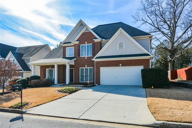 view of front of property with covered porch and a garage