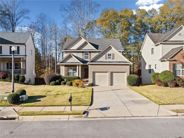 view of front facade with a front lawn and a garage