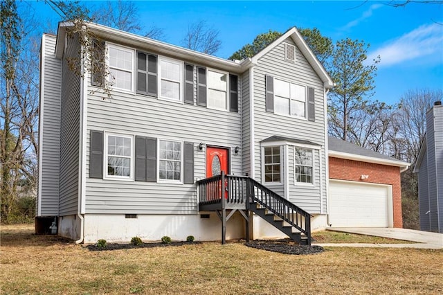 view of front facade featuring a garage and a front lawn