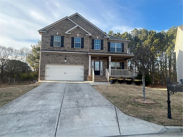 view of front of house with a garage, concrete driveway, brick siding, and a porch