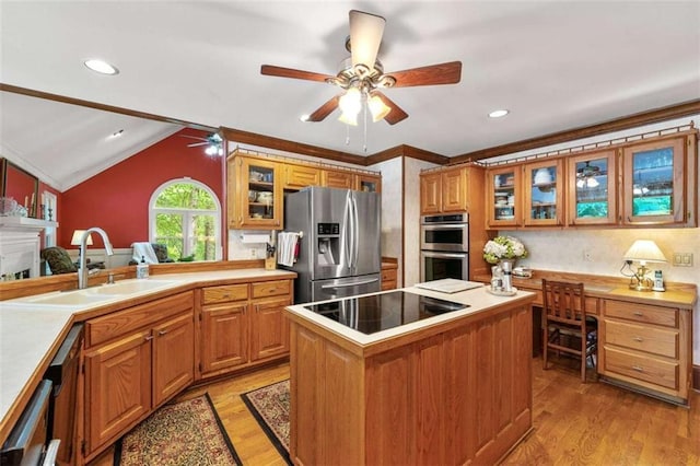 312 Crabapple Springs Way, Woodstock, GA 30188 - kitchen featuring stainless steel appliances, a sink, ceiling fan, light wood-type flooring, and ornamental molding