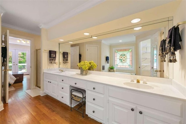 312 Crabapple Springs Way, Woodstock, GA 30188 - ensuite bathroom with ornamental molding, double vanity, wood finished floors, recessed lighting, and a shower