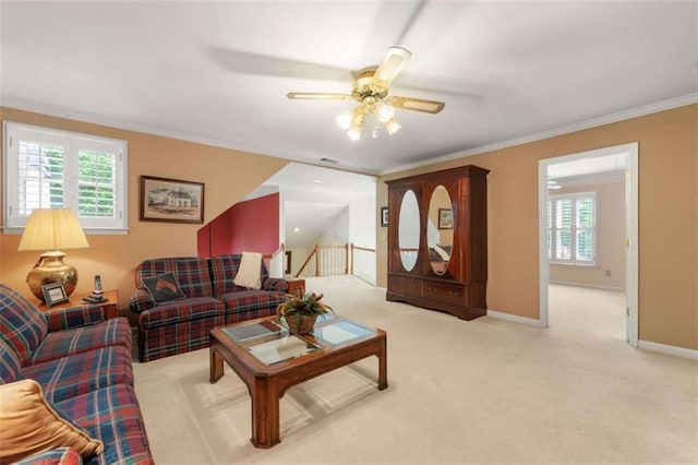 312 Crabapple Springs Way, Woodstock, GA 30188 - living room with light carpet, crown molding, ceiling fan, and baseboards