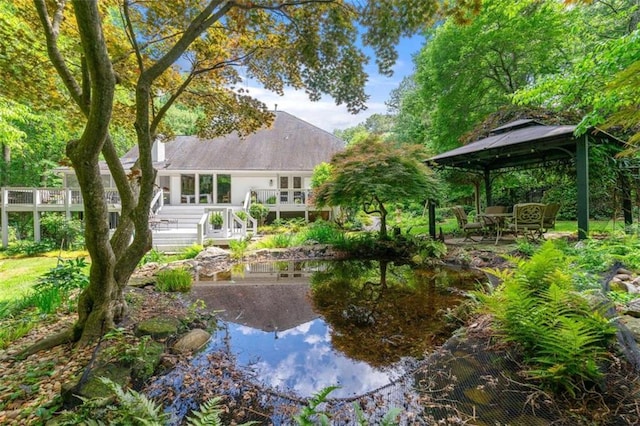 312 Crabapple Springs Way, Woodstock, GA 30188 - rear view of house with a gazebo and a wooden deck