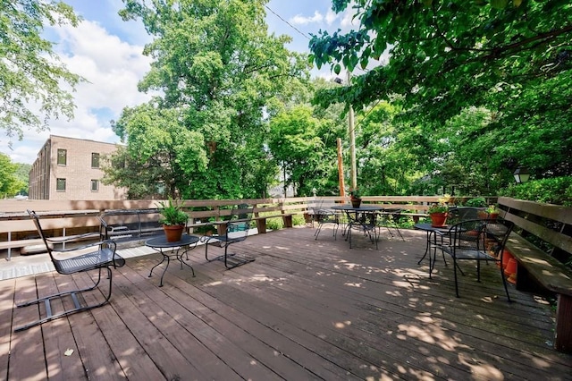 2260 Peachtree Rd NW Unit B4, Atlanta, GA 30309 - wooden terrace featuring outdoor dining area