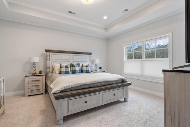 bedroom with a tray ceiling, baseboards, light colored carpet, visible vents, and recessed lighting
