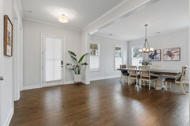 dining space with crown molding, baseboards, a chandelier, and dark wood finished floors