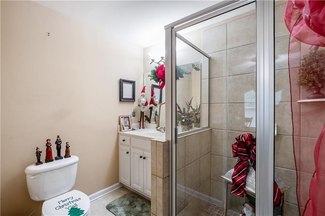 261 Double Springs Rd SW, Monroe, GA 30656 - bathroom with a shower stall, tile patterned flooring, vanity, and toilet