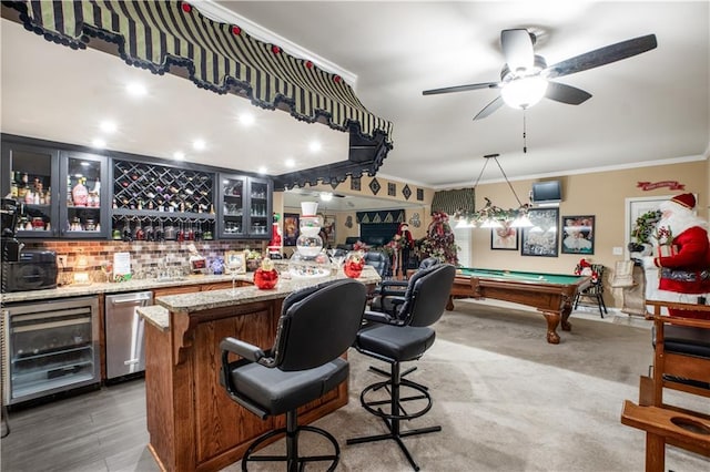 261 Double Springs Rd SW, Monroe, GA 30656 - indoor bar with wine cooler, crown molding, ceiling fan, billiards table, and tasteful backsplash