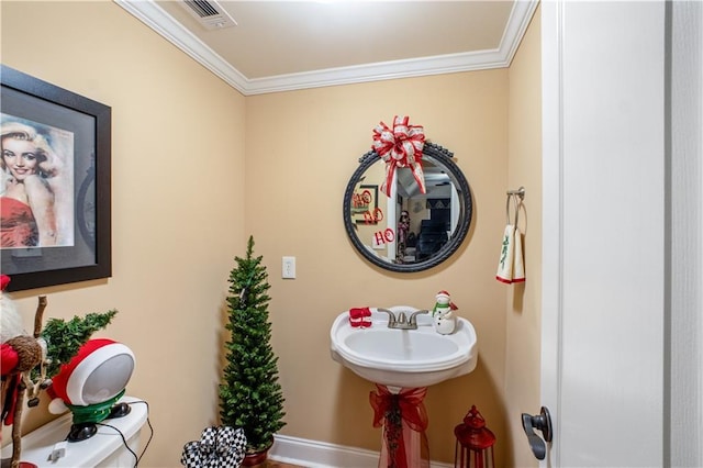 261 Double Springs Rd SW, Monroe, GA 30656 - bathroom with crown molding and baseboards