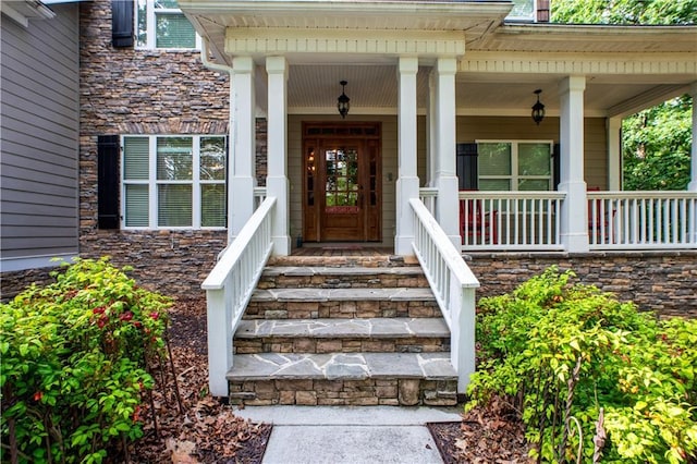 261 Double Springs Rd SW, Monroe, GA 30656 - entrance to property with stone siding and a porch