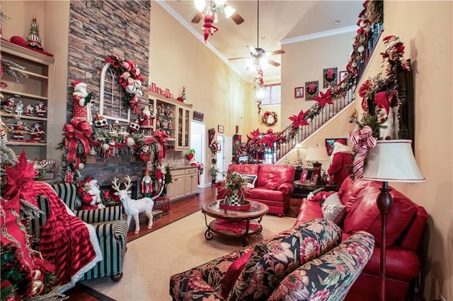 261 Double Springs Rd SW, Monroe, GA 30656 - living area with crown molding, stairway, a high ceiling, wood finished floors, and a ceiling fan