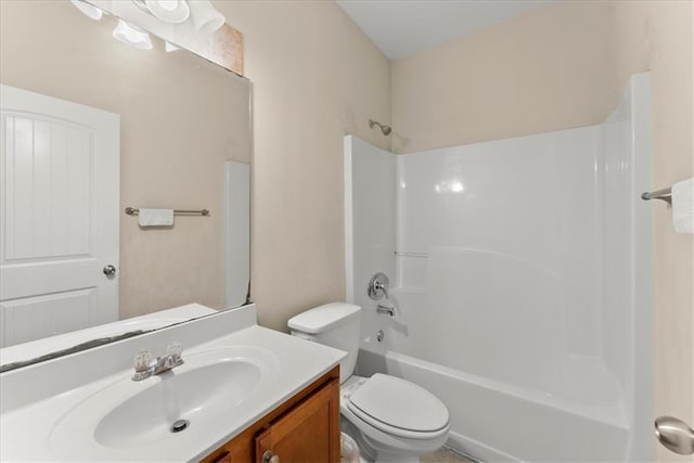 full bathroom with vanity, bathing tub / shower combination, and toilet