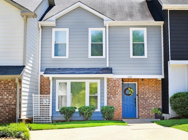 1206 Shiloh Cir NW, Kennesaw, GA 30144 - view of property with brick siding and a shingled roof